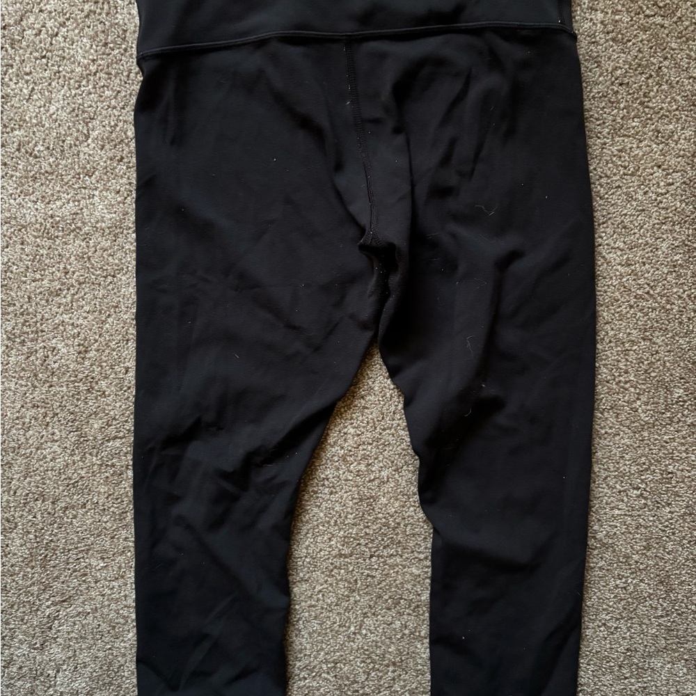 Lululemon Athletica Classic Black Capris With green lining